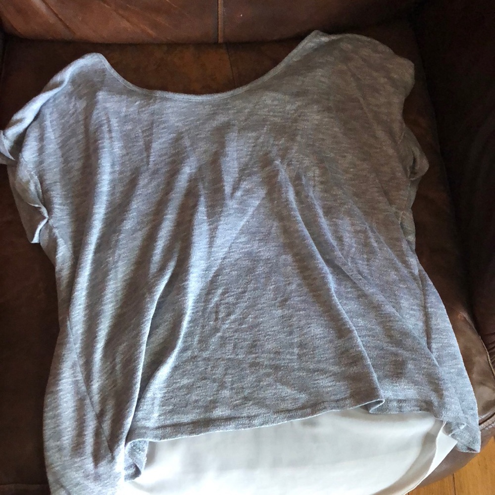 A grey and sheer laced t shirt